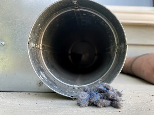Rancho Mission Viejo Dryer Vent Cleaning technician using specialized equipment to clear severe dryer vent blockage in Rancho Mission Viejo